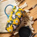 Ceramic coffee mug, porcelain latte mug, with lid, 17 oz, unisex, office and home décor, yellow floral pattern.
